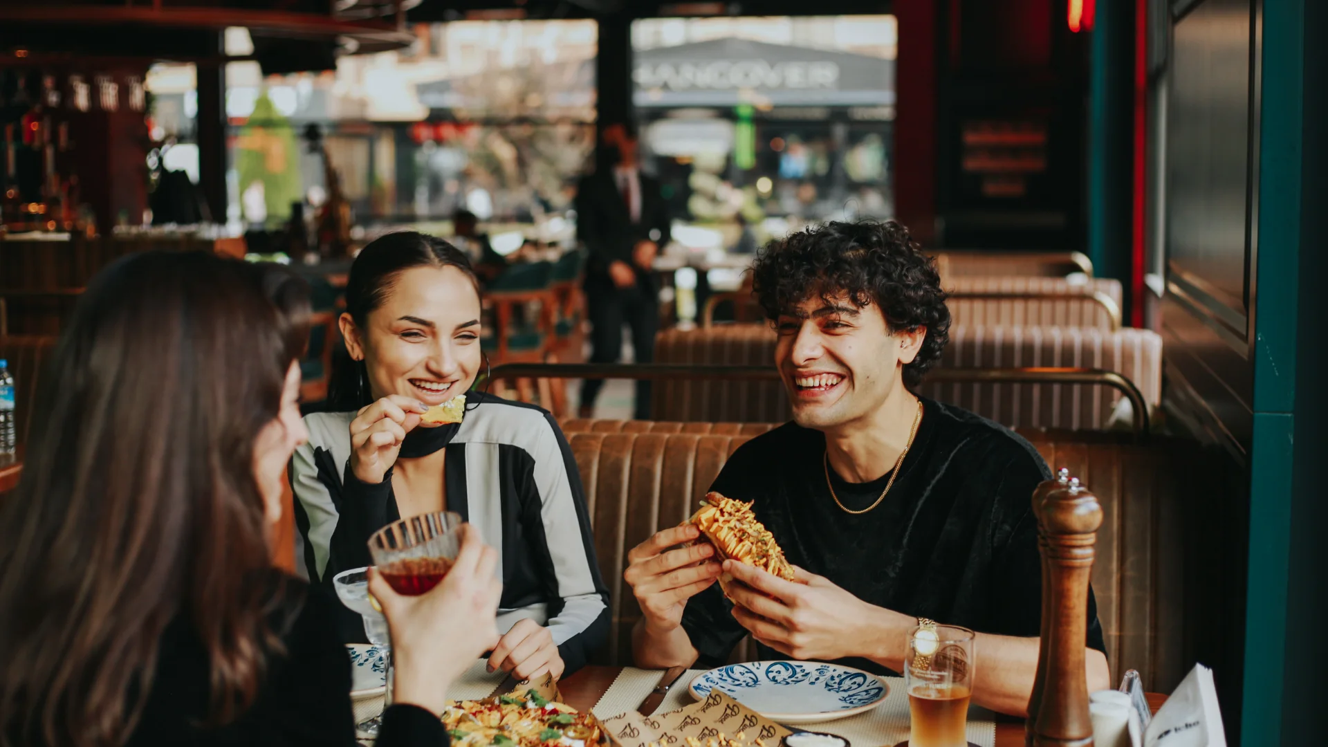 Friends sharing lunch in a restaurant