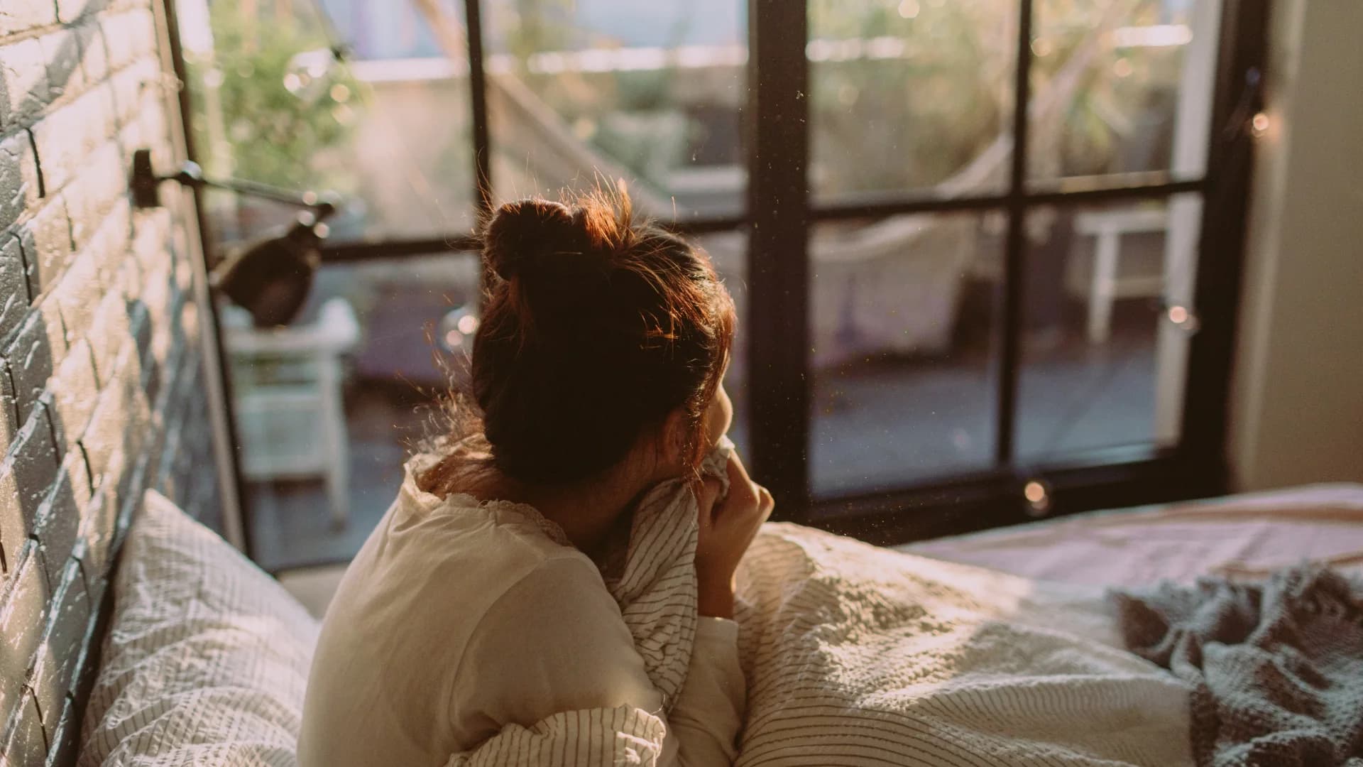 Person beginning the day in warm morning light